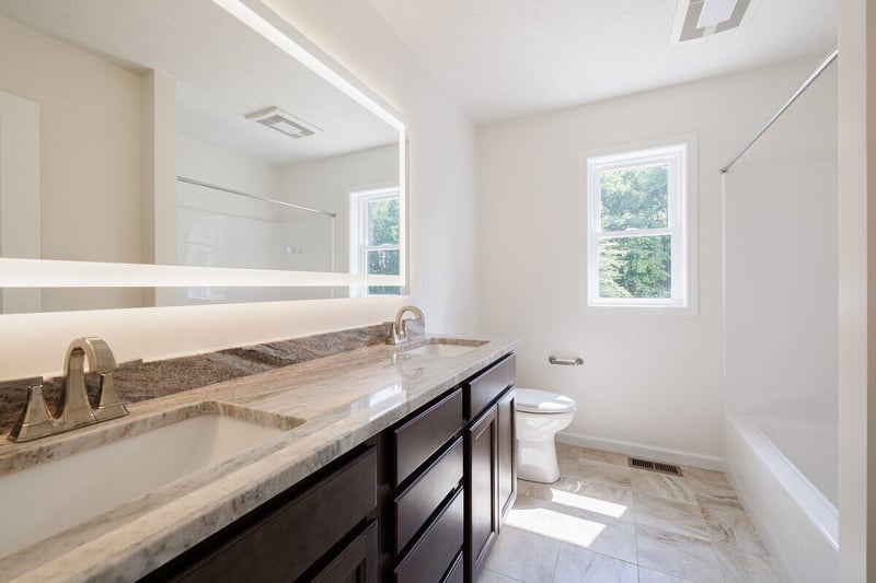 Double vanity in bathroom in Rochester, NY custom home by Gerber Homes