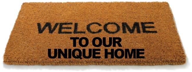 Outdoor Home Mat That Reads "Welcome to our Unique Home"