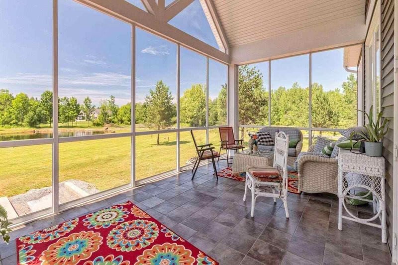 Inclosed Patio All Windows stone flooring by Gerber Homes228 Ridge Road