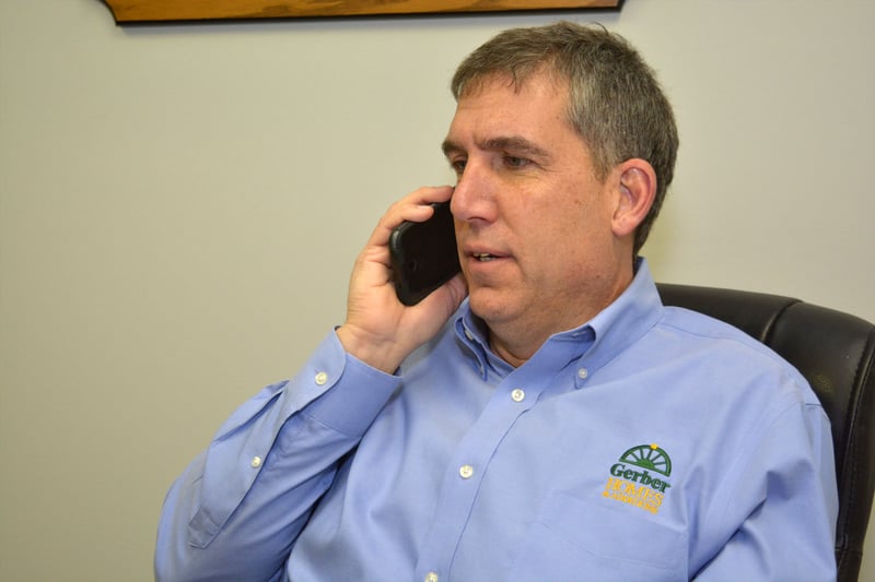 John Graziose of Gerber Homes in office on phone