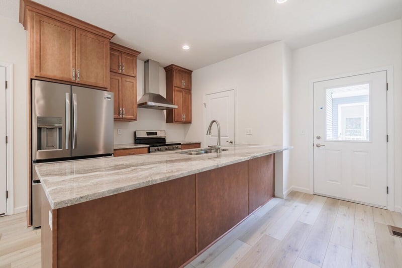 Kitchen in Rochester, NY custom home with in-law suite layout by Gerber Homes