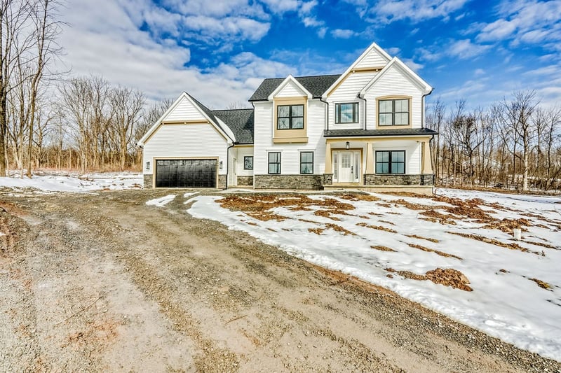 Luxury new construction home exterior in Victor, NY by Gerber Homes