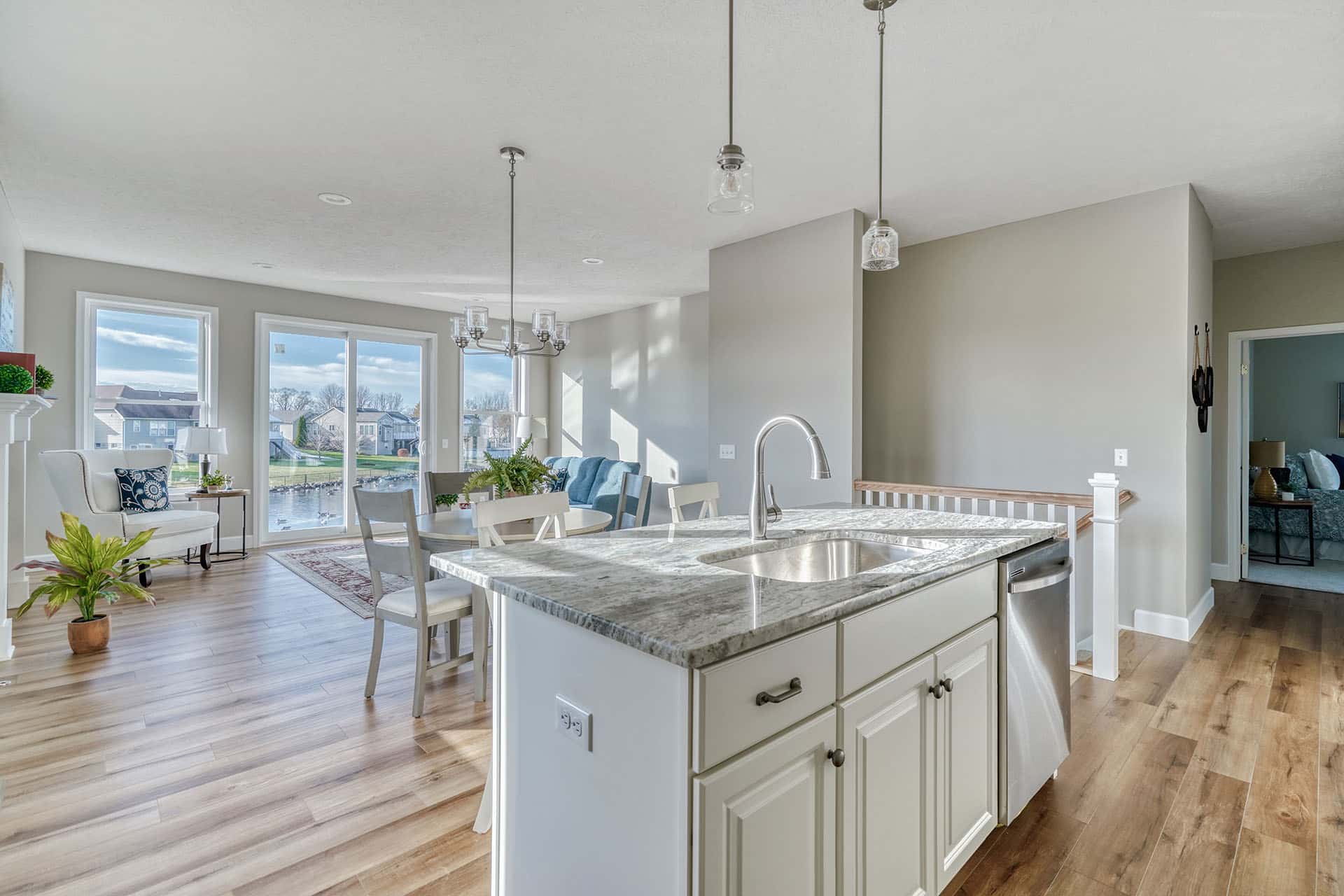 New custom kitchen with island looking over to living room