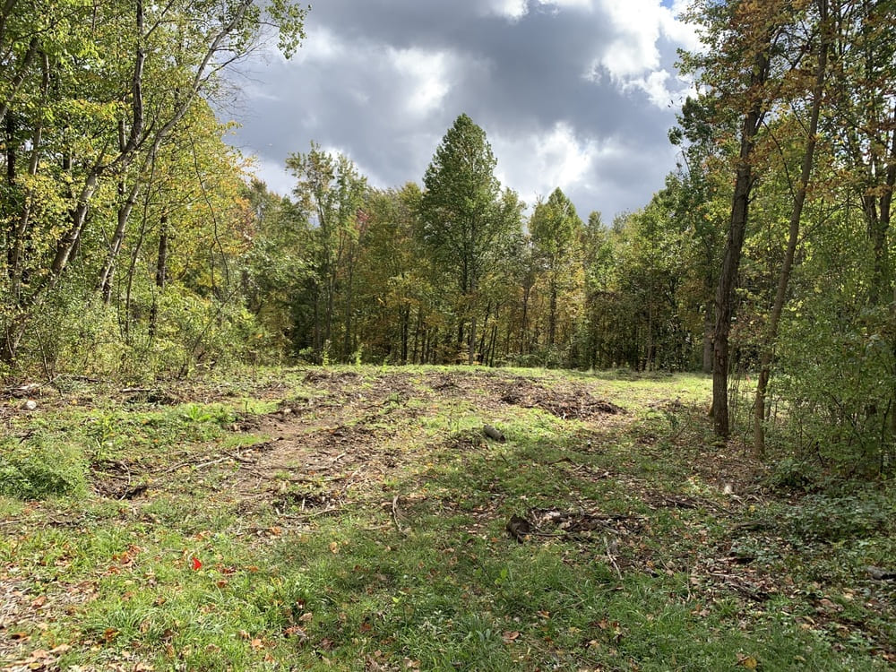 Ontario Center Road by Gerber Homes custom home community lot on sunny day 