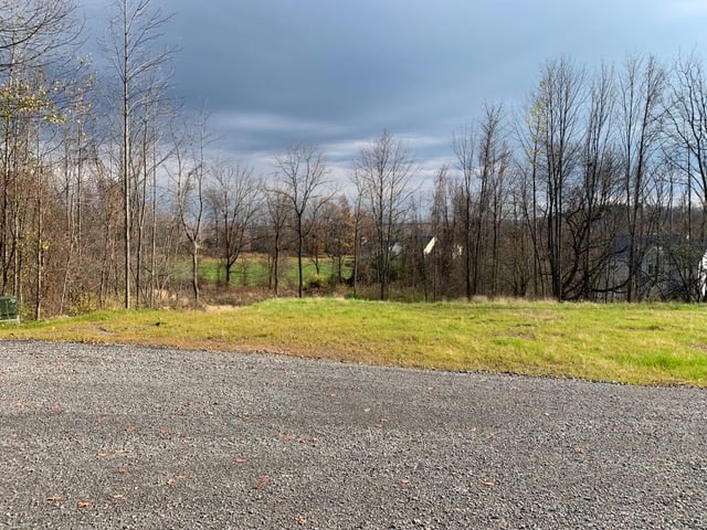 Scout Path new home construction community home site on cloudy day in Victor, NY