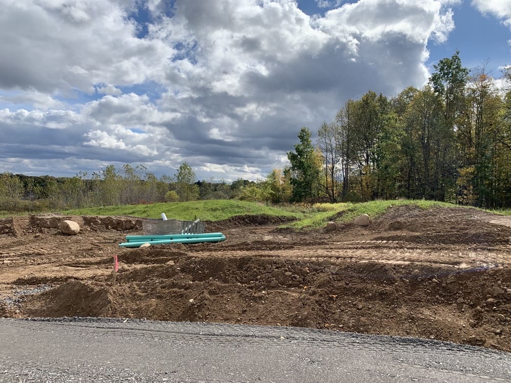 Shot of Orchard View Estates custom home community lot site progress in Walworth, NY