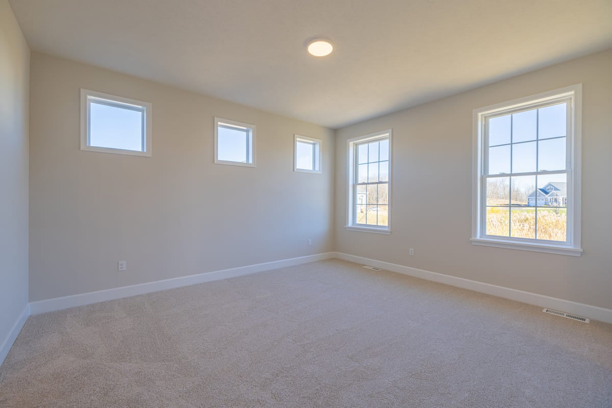 Bedroom in home at The Cottages of Canandaigua new home community