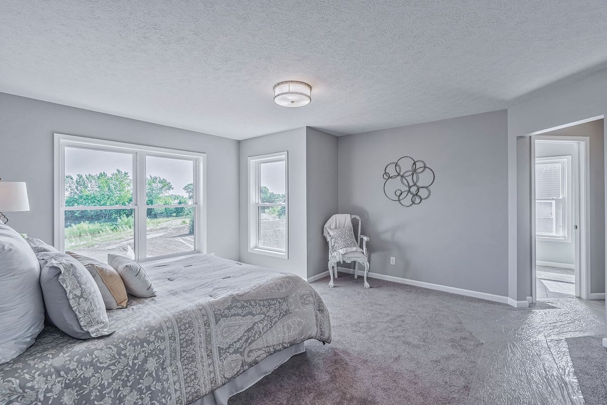 Master suite bedroom in custom home build by Gerber Homes