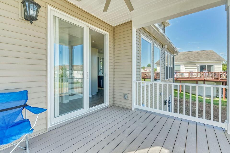 Custom In-Law Addition With Sliding Glass Door Opening to Raised Deck.