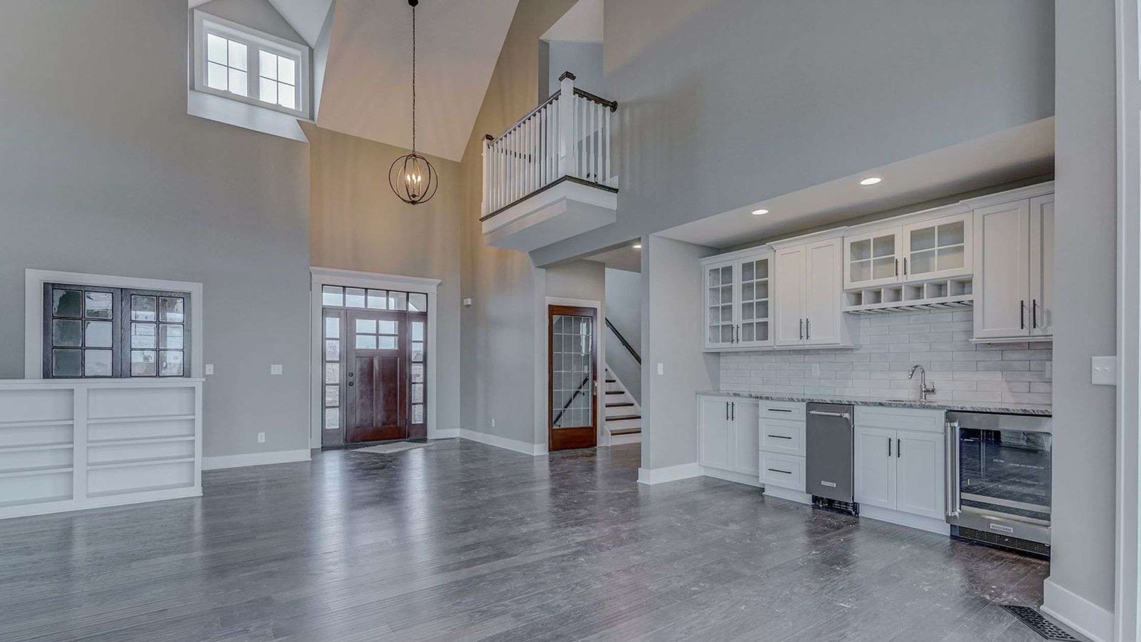 What will your new Rochester Home Cost be this Year?, Kitchen.Foyer.Cathedral.Balcony.Loft.WhiteCabinets.Stanedinteriordoors