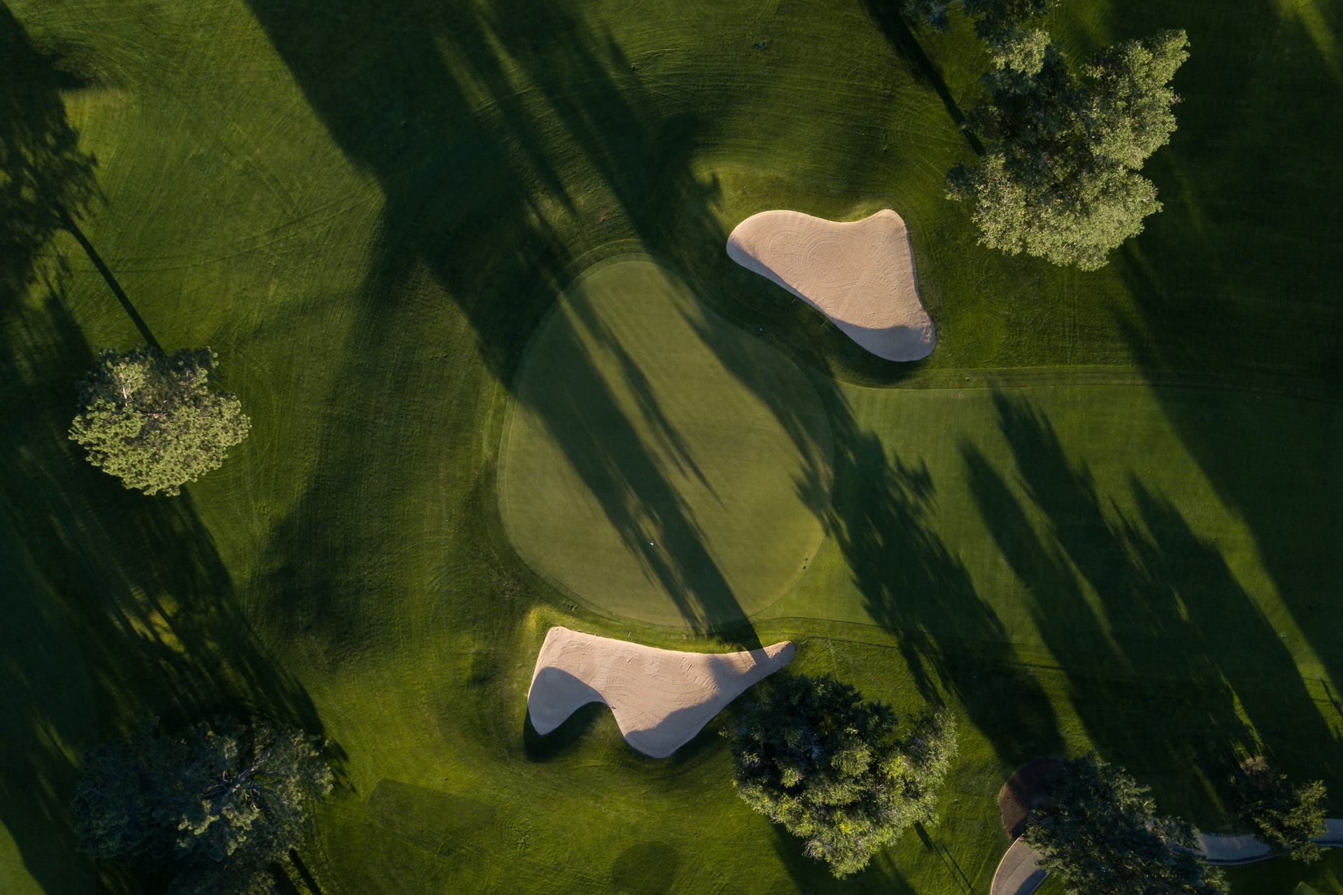 above shot of golf course green with sandtrap in sodus