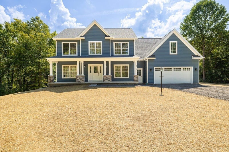 Two-story custom home exterior by Gerber Homes near Rochester, NY