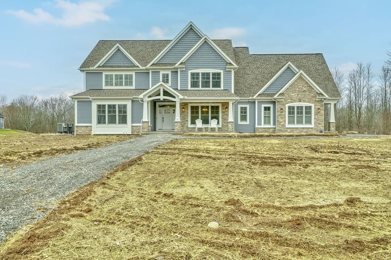 Two-story custom home exterior near Rochester, NY by Gerber Homes